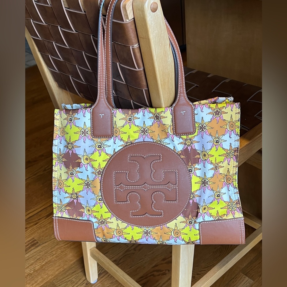 Tory Burch Nylon fabric leather trimmed purse. Yellow/Pink in color.